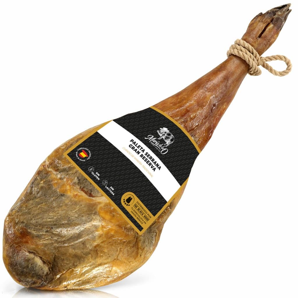 Cured spanish serrano ham with a label on a white background